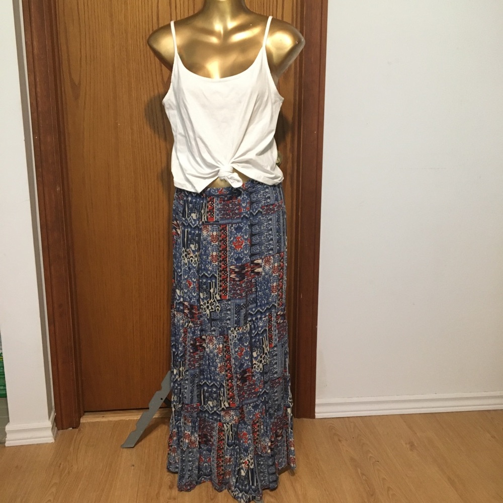 White knotted tank top and patterned maxi skirt